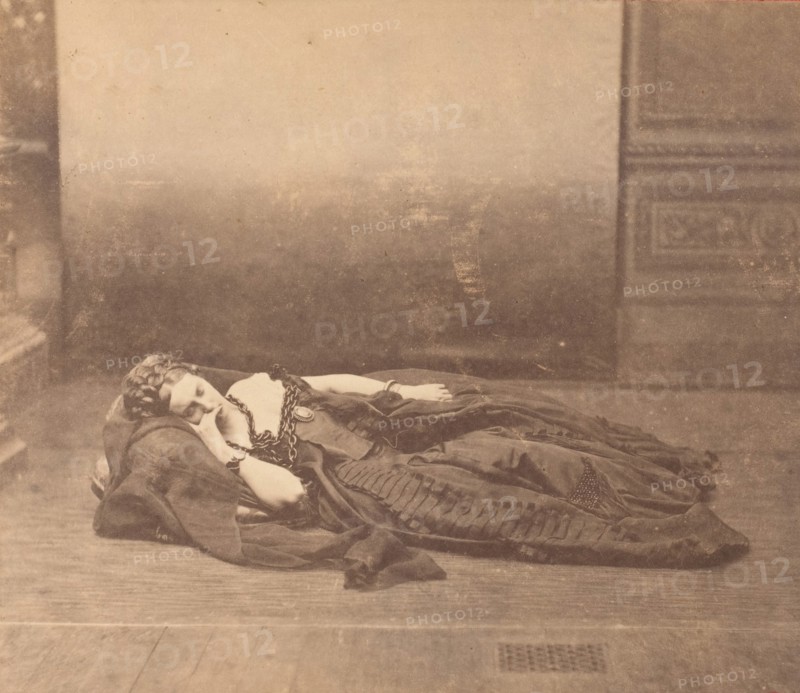 [La Comtesse Reclining in Dark Dress with Chain Around Neck], 1861-65.