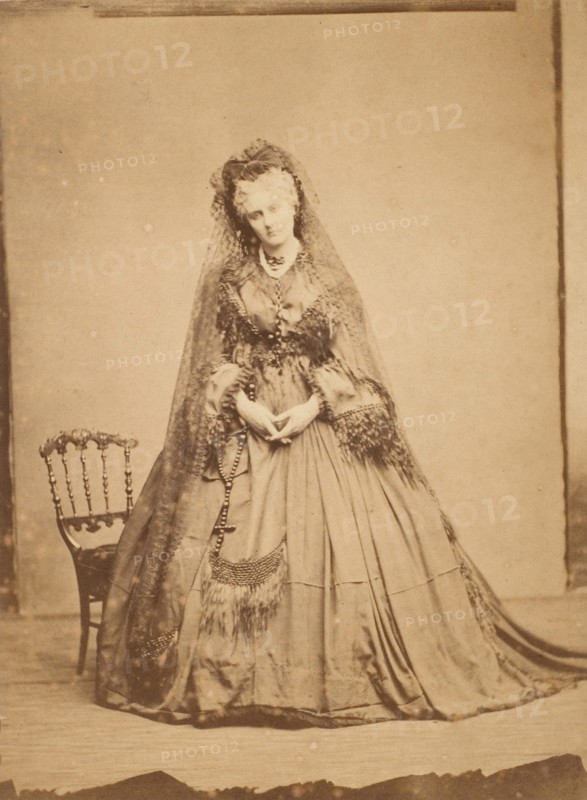 [Standing with a Rosary], 1861-67.