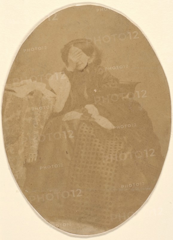 [La Comtesse at Table with Hand to Face], 1860s.