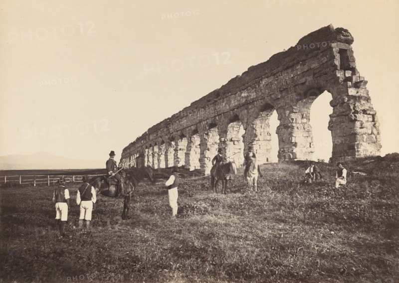 [Men on Horse by Roman Aqueduct], 1860s.