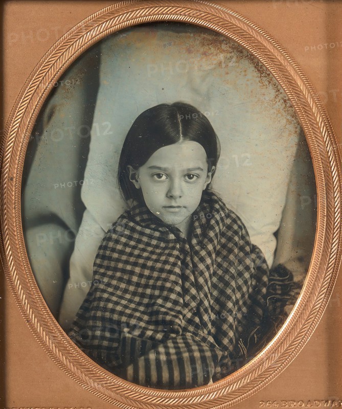 [Young Girl Wearing Gingham Shawl, Resting on Pillow], 1853-56.