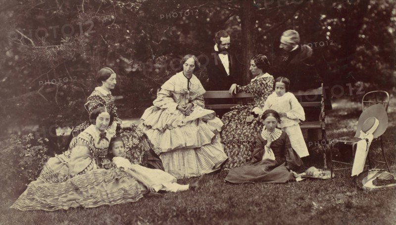 [Group Portrait of Four Women, Two Men and Three Children in a Garden], 1850s-60s.