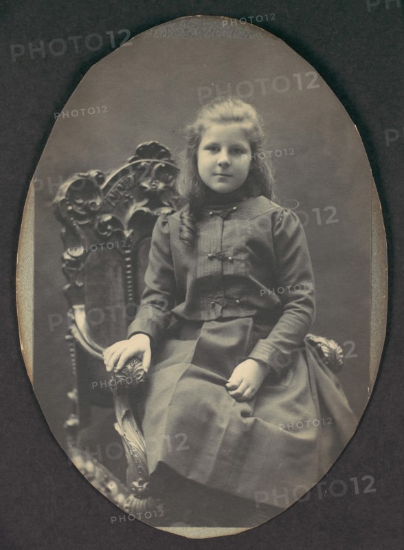 [Girl with Ringlets, Seated, Three-Quarter Length], 1890s.