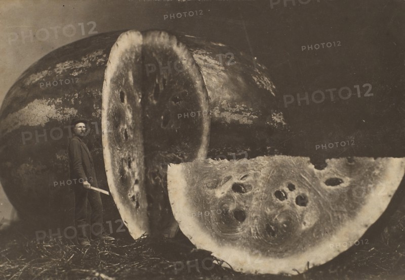 Man Cutting Watermelon, 1898-1903.