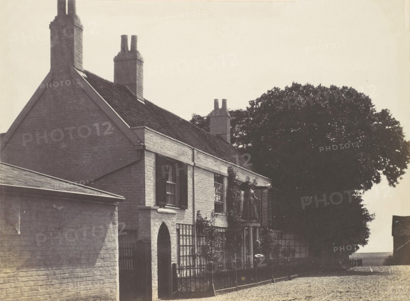 House with Woman on Balcony, Man Standing Below, ca. 1857.
