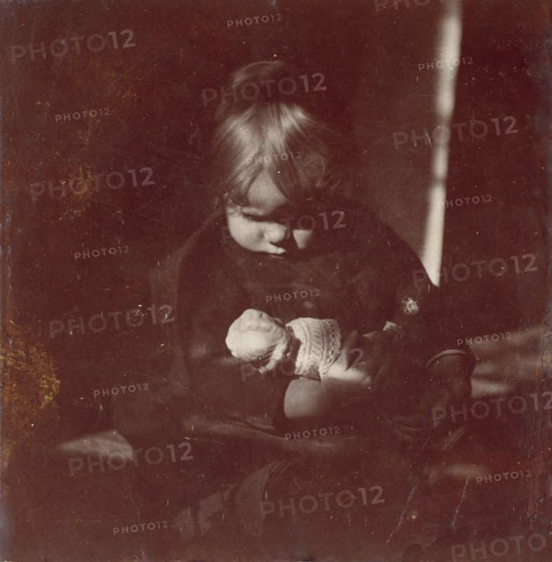 Betty Reynolds with Doll on Lap, ca. 1885.