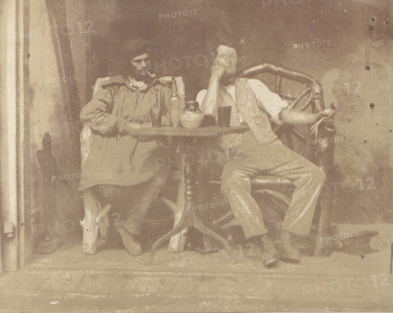 Two Men Seated at a Table, 1850s.