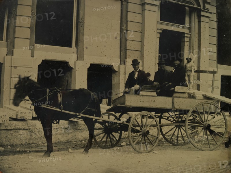 Three Men Seated in a Horse-Drawn Buggy in Front of a Building Under Construction, 1850s-60s.
