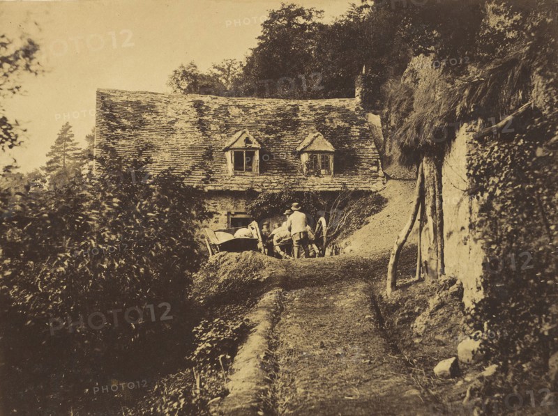 Rustic Cottage with Figures and Carts, ca. 1855.