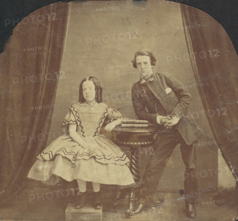Young Girl, Seated, with Young Boy, Leaning on Table, 1860s.