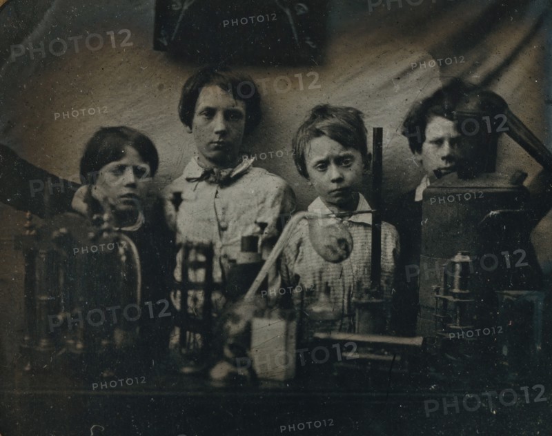 Boys Behind a Science Experiment, late 1850s.