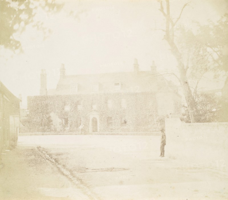 Man in Courtyard Before House, 1850s.
