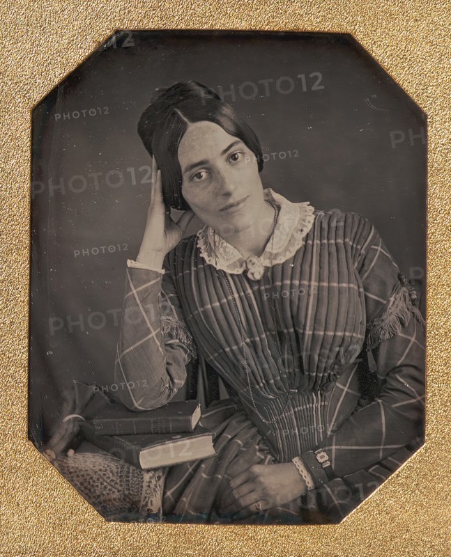 Young Woman with Elbow Resting on Small Pile of Books and Head on Hand, 1840s.
