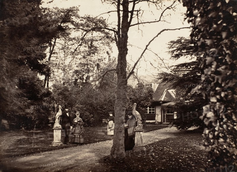 Autumn Scene with People on Lawn near Cottage, ca. 1855.