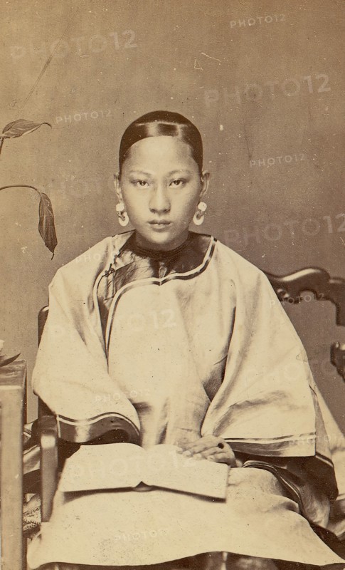 Young Woman with Earrings, 1870s.