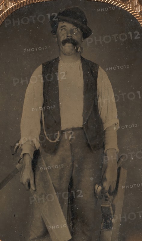 Carpenter with Saw, Hammer, and Jointer, 1860s-70s.