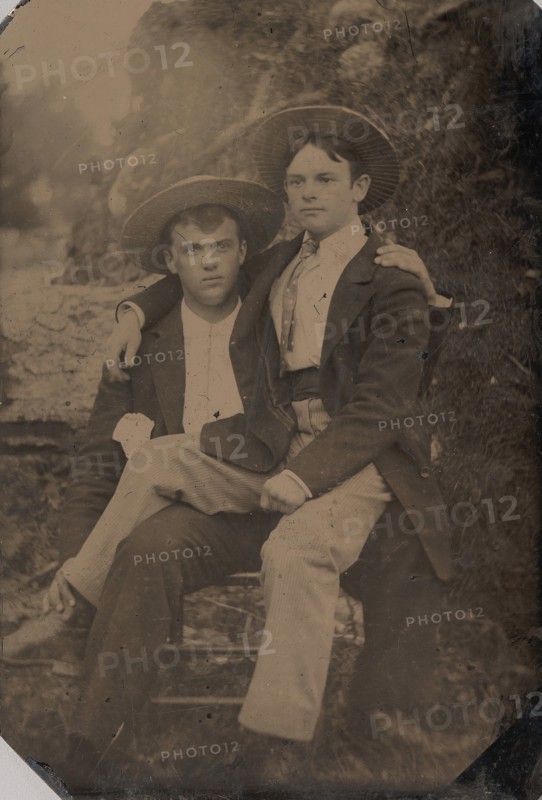 Two Young Men in Straw Hats, One Seated in the Other's Lap, 1870s-80s.