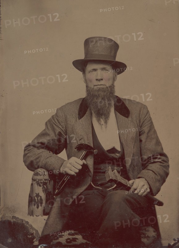 Man in Top Hat Holding a Hammer and Wrench, 1860s- early 70s.