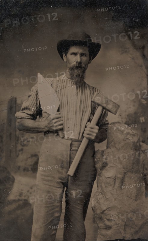 Mason (?) Holding a Trowel and Sledgehammer, 1870s-80s.