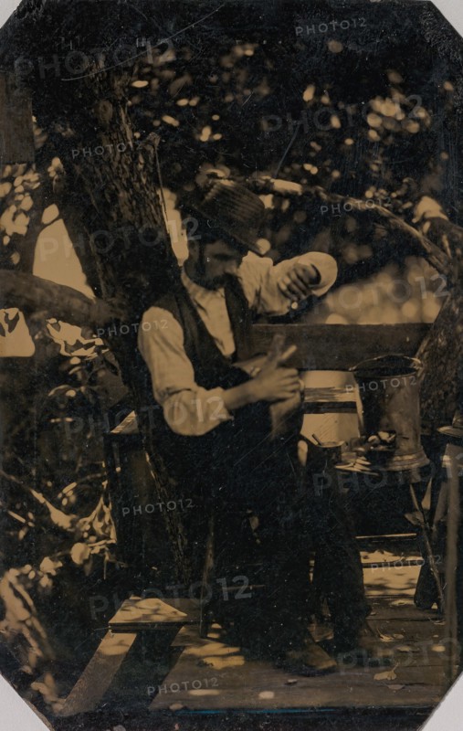 Tinsmith Working Under a Tree, 1870s.