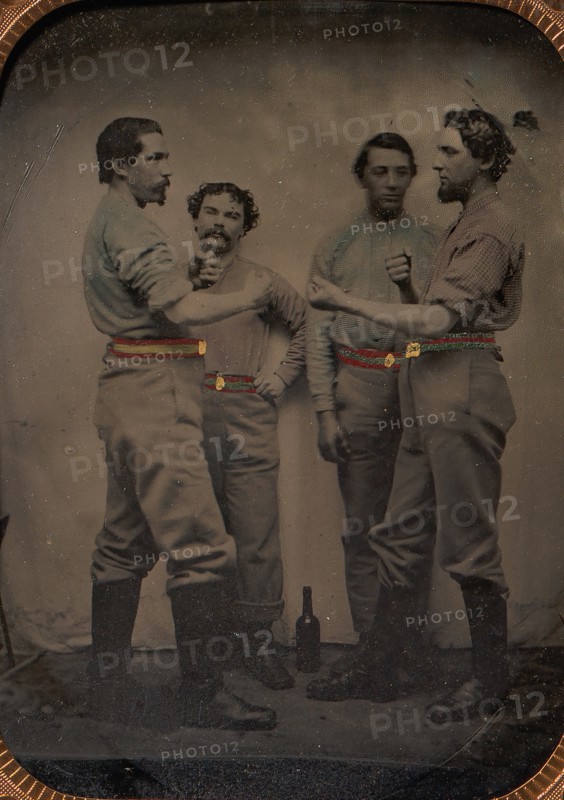 Four Pugilists with a Bottle at Their Feet, 1870-80s.