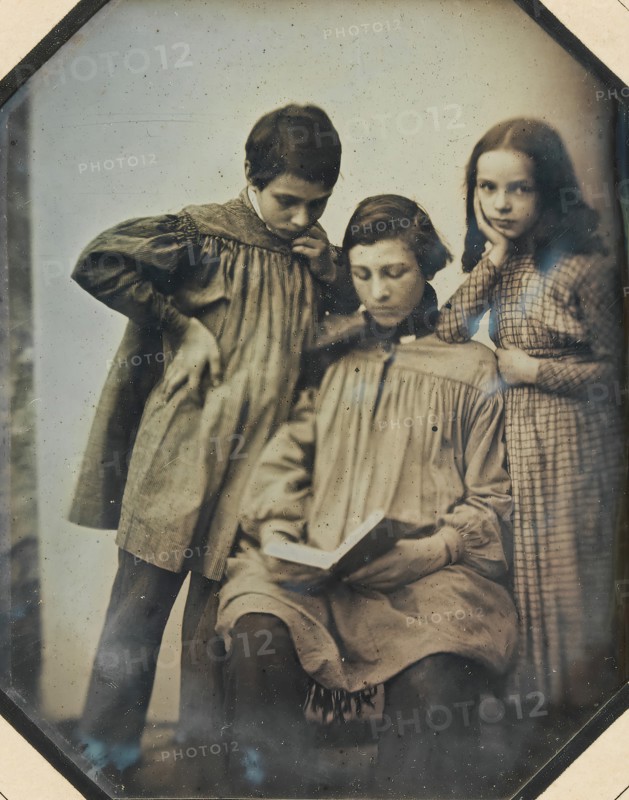 [Three Children, One Seated Holding an Open Book, the Other Two Standing, in Front of a Light Background], ca. 1845.