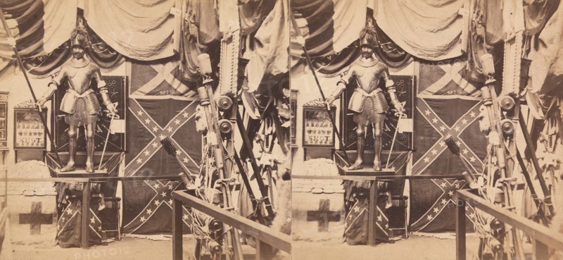 225 Stereographs of United States Architecture, 1850s-90s. [The Great Metropolitan Sanitary Fair. No. 1702. The Department of Arms and Trophies. Showing Confederate Battle Flags, Suit of Ancient Armor, and Trophies from the Mexican War].