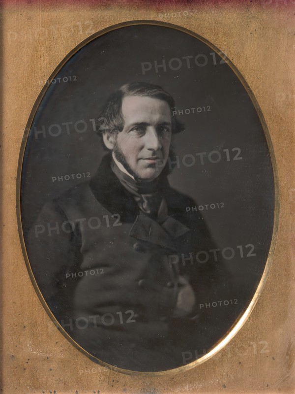 Middle-aged Man with Chinstrap Beard, Hand Tucked Inside Buttoned Jacket, 1840s-50s.