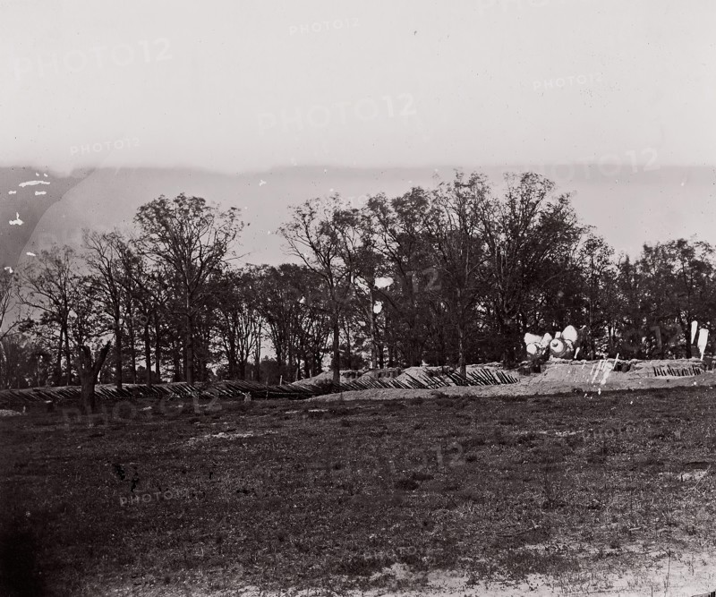 [Earthworks at the edge of a forest]. Brady album, p. 132, 1861-65. Formerly attributed to Mathew B. Brady.
