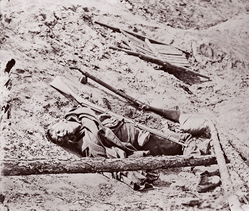Dead Confederate Soldier at Fort Mahone, Petersburg, 1864. Formerly attributed to Mathew B. Brady.