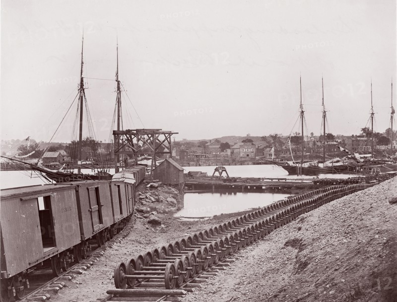 Unloading Supplies for U.S. Military Railroad opposite Richmond, Virginia, ca. 1865. Formerly attributed to Mathew B. Brady.
