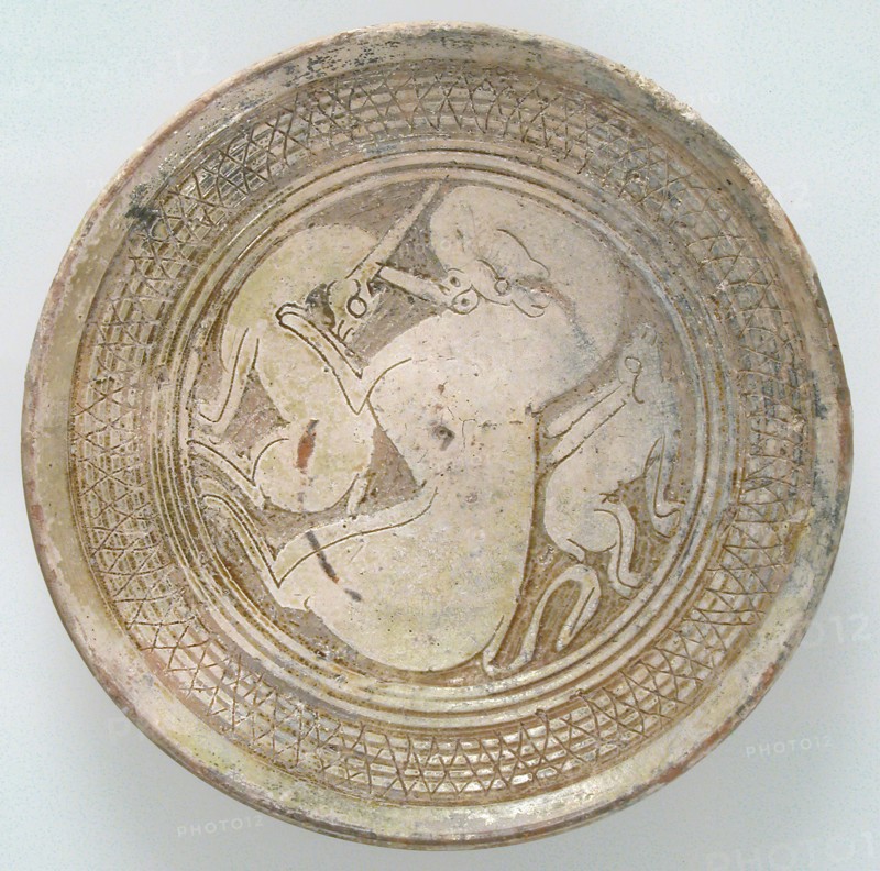 Bowl with Three Animals, Byzantine, 1100-1300. long-eared rabbit with a large panther and a deer.
