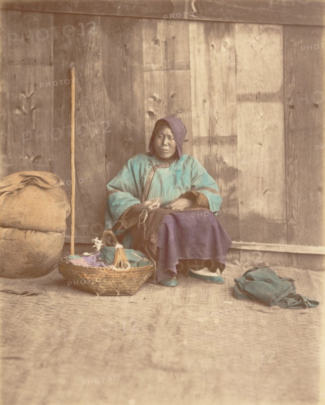 [Chinese Woman Sitting with Basket], 1870s.