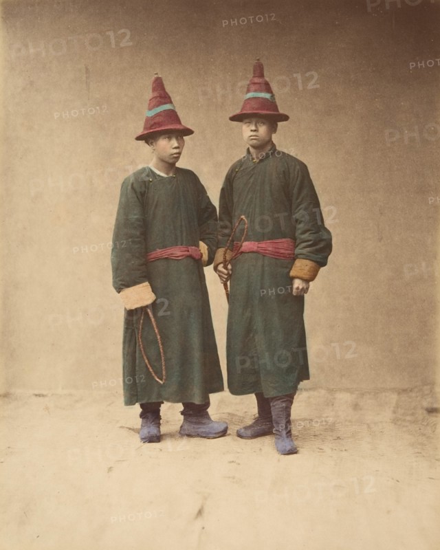 [Two Chinese Men in Matching Traditional Dress], 1870s.