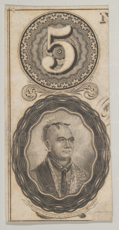 Banknote motifs: the number 5 and a portrait of Thayendanegea