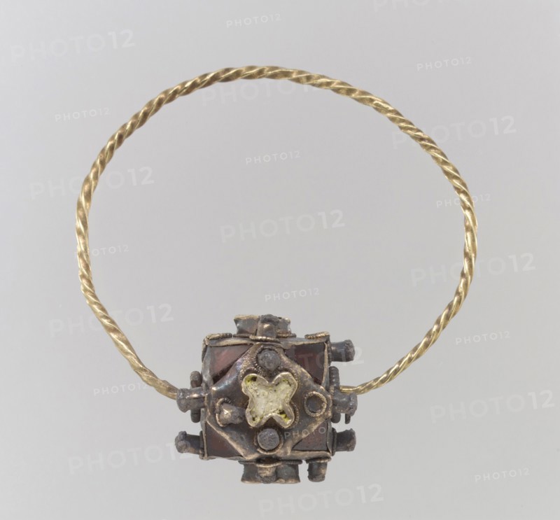 One of a Pair of Gold Earrings with Garnets, Frankish, second half 8th century.