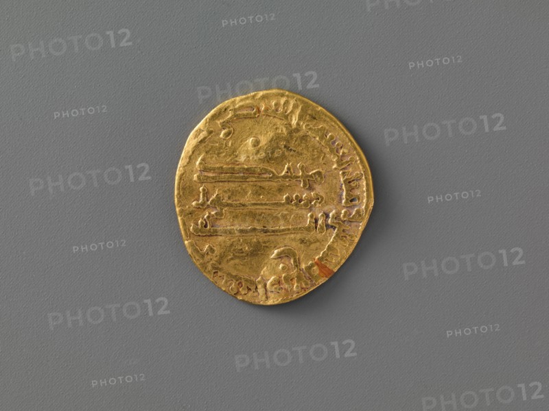 Coin, Iran, dated A.H. 164/ A.D. 780. Issued during reign of the Abbasid caliph al-Mahdi with inscription of Qur?an verses 33:9/9:61
