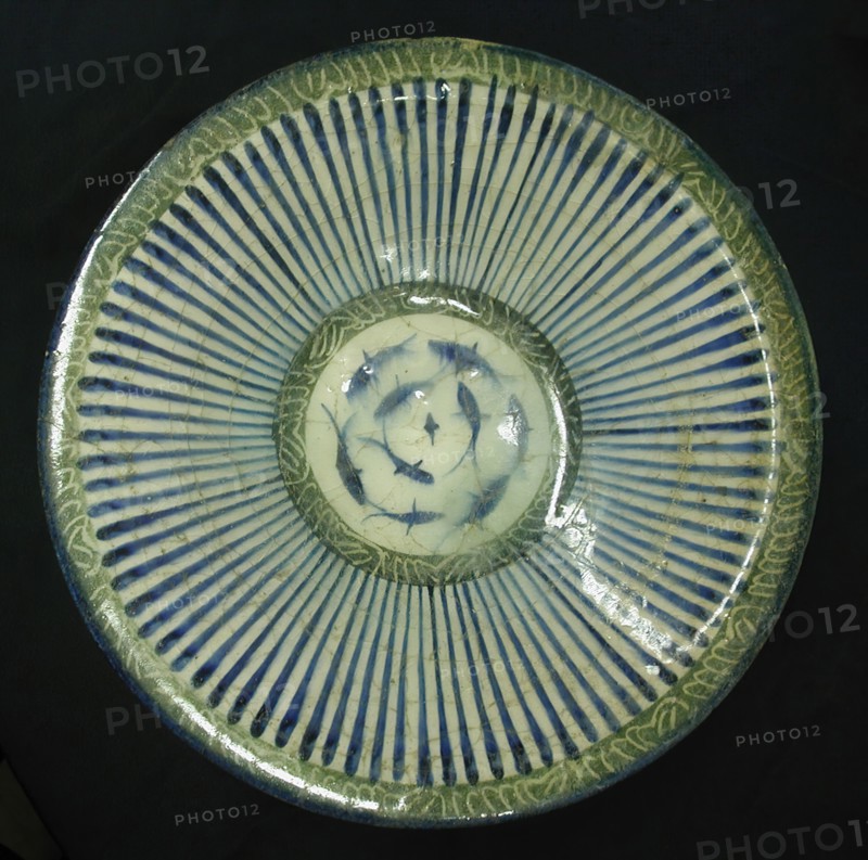 Bowl with Central Fish Motif, Iran, 13th century. Juxtaposition of fish with magical letters suggests the bowl had talismanic properties