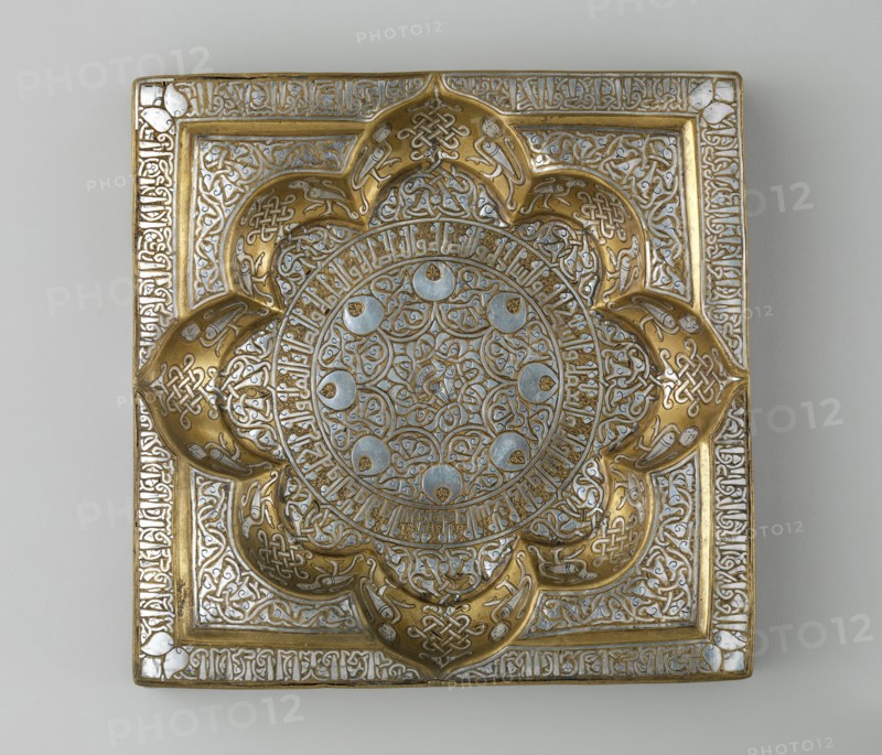 Square Tray with Recessed Medallion, Iran, early 13th century. Kufic inscription conveys lengthy benedictions in Arabic to an anonymous owner.