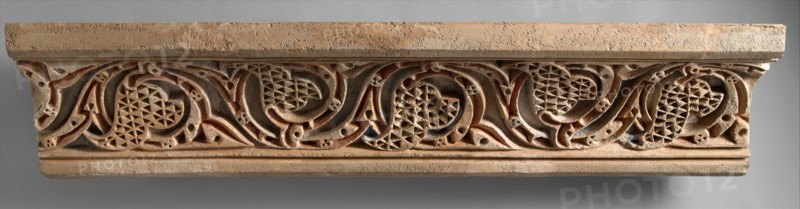 Fragment of a Painted Cornice Panel with Scrolling Vines, Iran, 11th century.