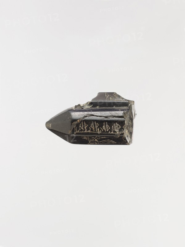 Cylindrical Pendant with Magical Writing, Iran, 9th-10th century. The inscription remains undeciphered and may be a magical alphabet.