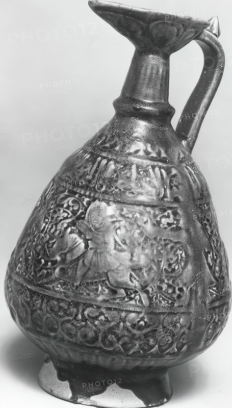 Ewer with Molded Inscriptions and Figures on Horseback, Iran, last quarter 11th-12th century.