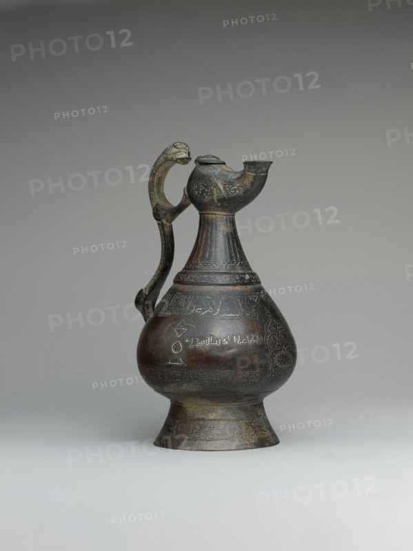 Ewer with Lamp-Shaped Spout, Iran, late 12th century. Arabic inscriptions of good wishes to the owner.