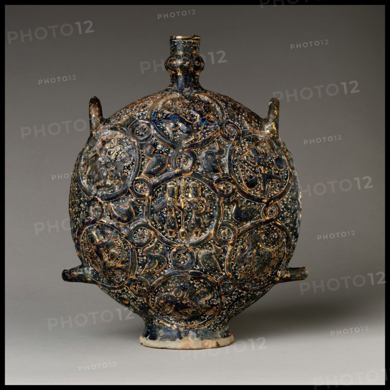 Flask with Zodiac Medallions, Iran, first half 14th century, with additions first half 20th century. Gemini and Sagittarius in centre.