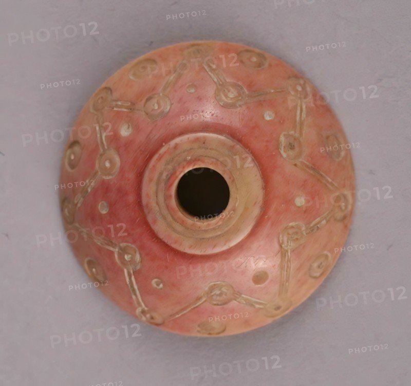 Spindle Whorl, Iran, 9th-10th century.  Excavated at Nishapur, providing evidence the city possessed a thriving textile industry.