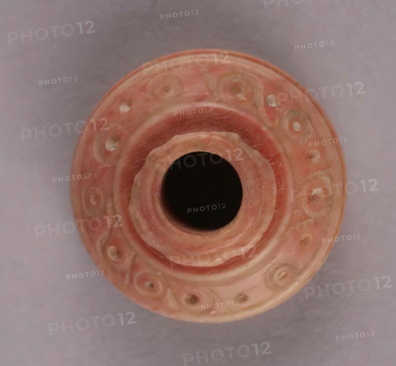 Spindle Whorl, Iran, 9th-10th century.  Excavated at Nishapur, providing evidence the city possessed a thriving textile industry.
