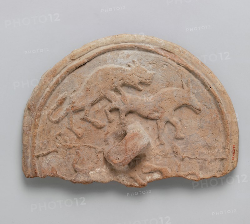 Lid with a Lion attacking a Bull, Iran, 12th century.