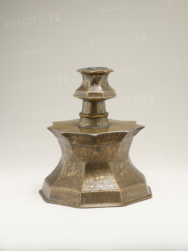 Candlestick with Figural Imagery, Iran or Iraq, first half 14th century. Nine-sided candlestick with depictions of courtly pastimes