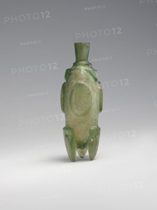 Molar' flask, probably Iran, 8th-9th century. Called a molar flask because its feet resemble the roots of molar teeth.