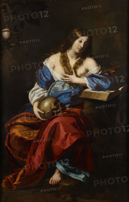 The Penitent Magdalene, 1655-1665. Painting also known as 'Mary Magdalene in the Wilderness'. Mary Magdalene is depicted leaning against a bible on her left and represented with her traditional attributes: a crucifix (in the crook of her left arm), a skull (in her right hand), and a jar of ointment (in a niche, upper left corner).